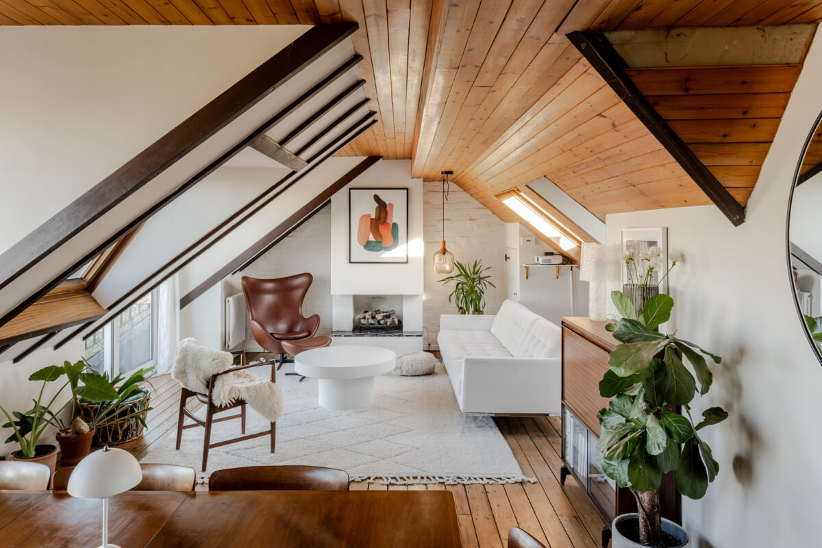 A Light Duplex Apartment in an Arts and Crafts Building 4 light attic living room wooden ceiling