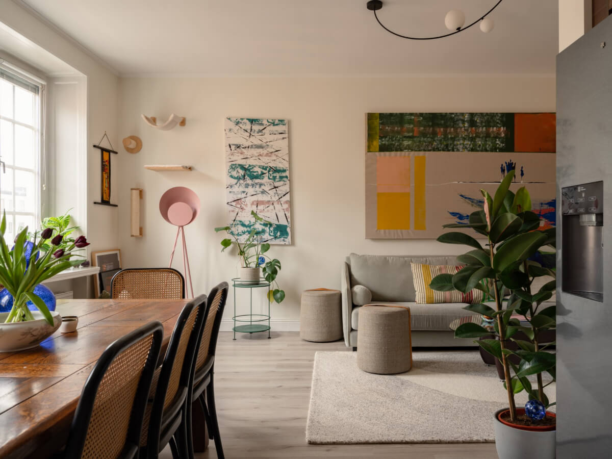A Pink and Orange Bedroom in a Light Stockholm Apartment 1 light beige walls open plan living space