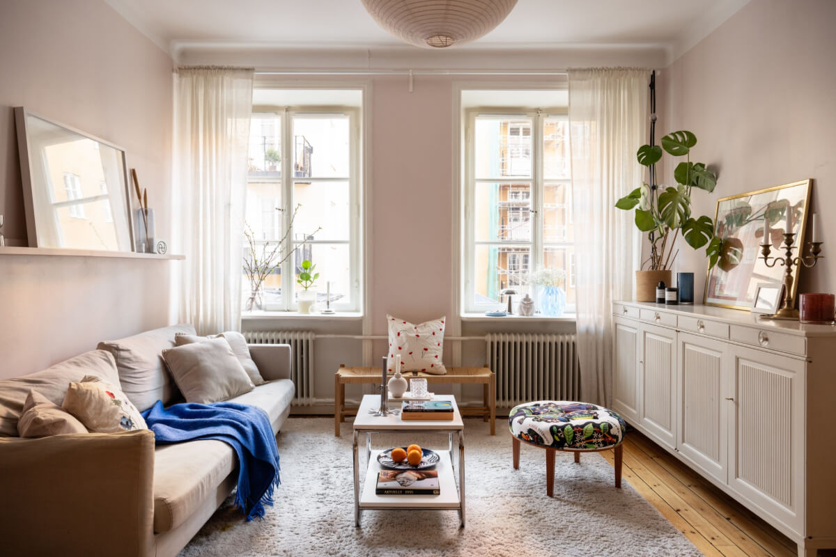 living room large window light pink walls
