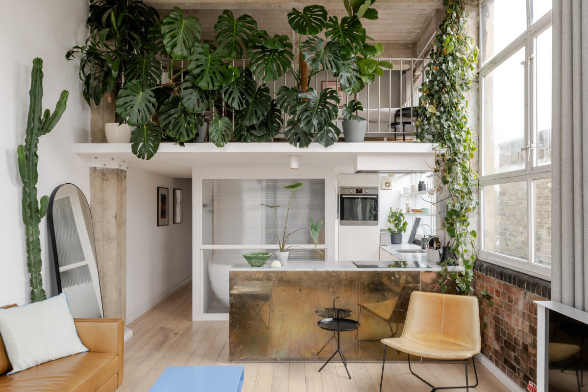 A Plant-Filled Loft Apartment in a Former Clothing Factory 1 london loft with plants