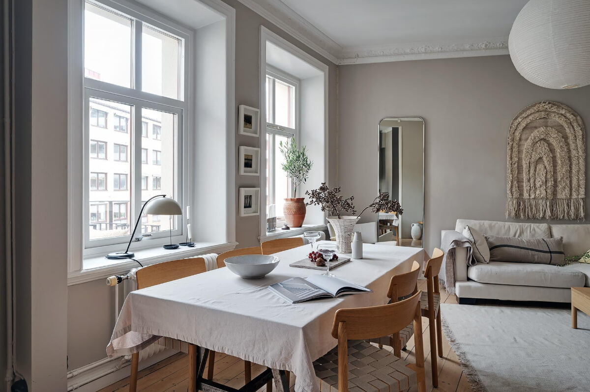 A Gothenburg Apartment with a Small Dark Green Bedroom 7 open-plan-gray-scandi-living-space.jpg