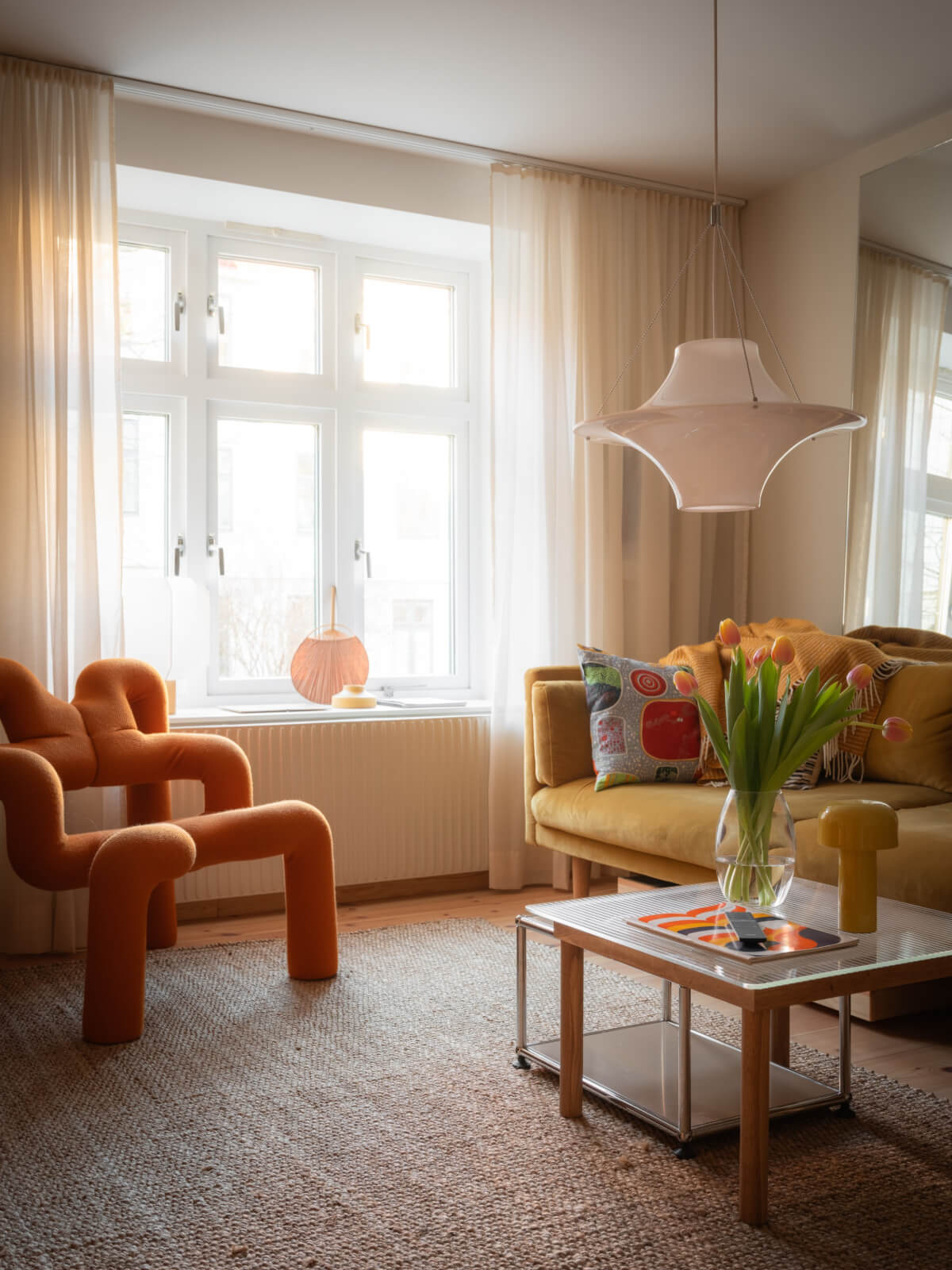 small living room large rug orange chair