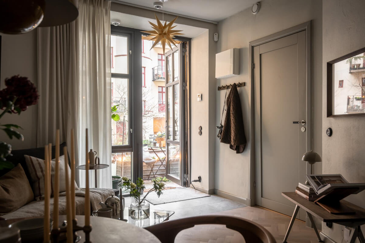 A Small Ground Floor Apartment Decorated in Gray Tones 15 small living room with terrace