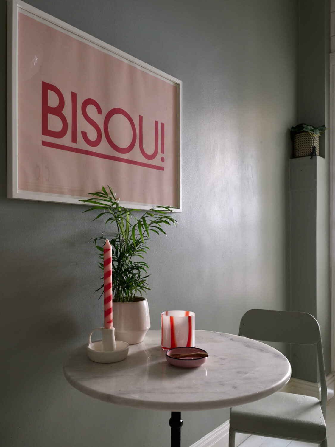 A Charming Small Apartment with a Fresh White Kitchen 11 small marble kitchen table