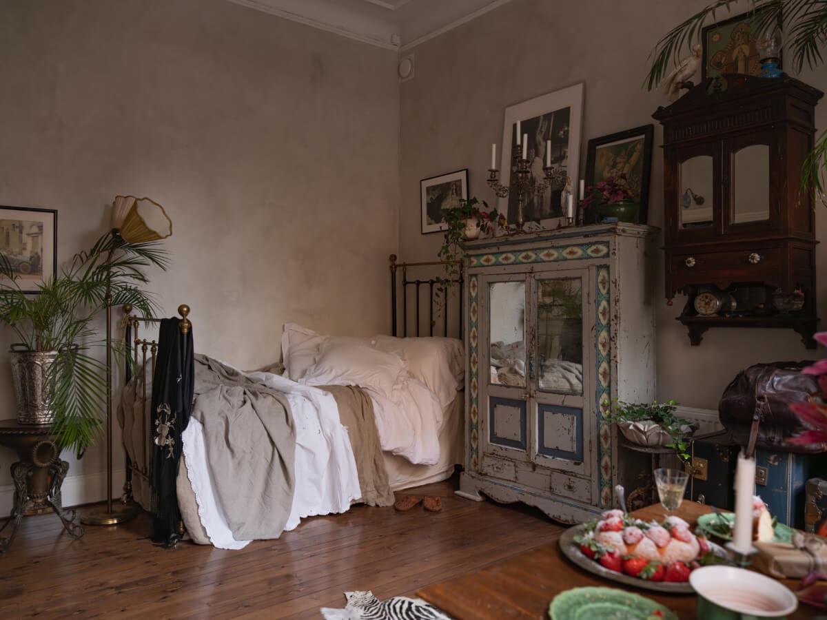 10 Affordable U.S. Cities to Live Alone in 2026, According to the Carrie Bradshaw Index 3 antique studio wooden floor gray walls