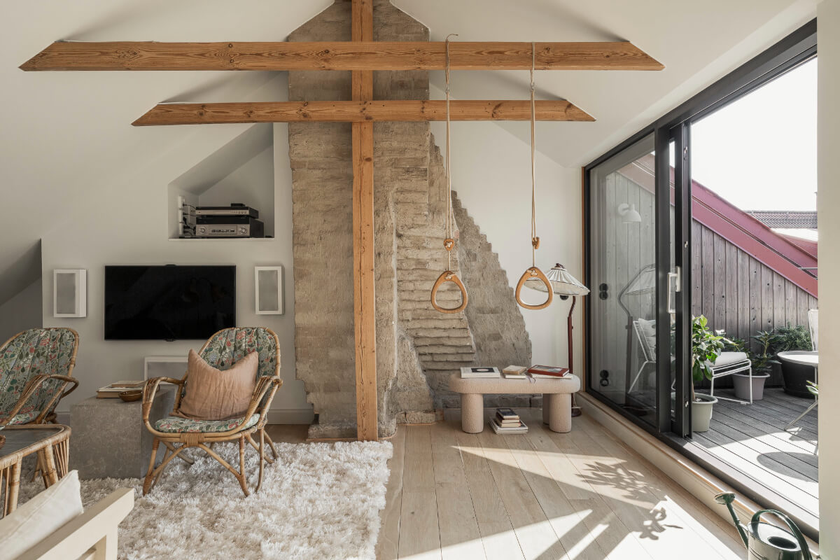 A Swedish Duplex Apartment Inspired by A Danish Summer House 1 attic living space exposed materials wooden beams