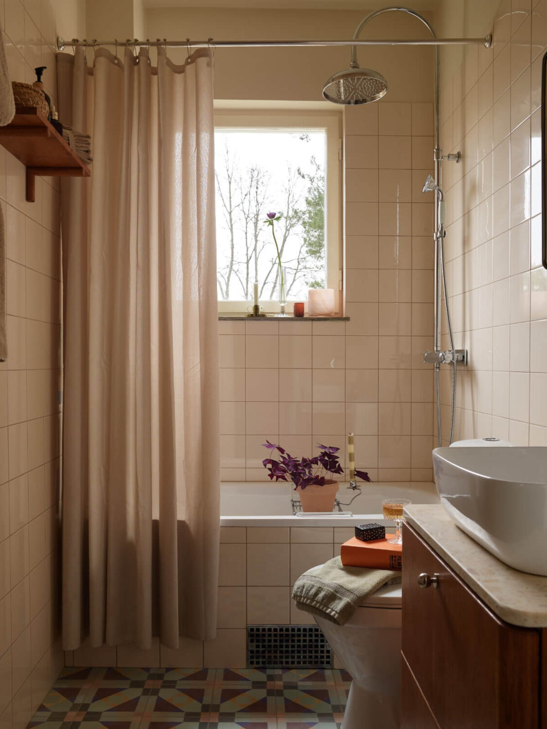A Renovated 1940s Apartment with Colorful Bedrooms 25 bathroom colorful floor tiles