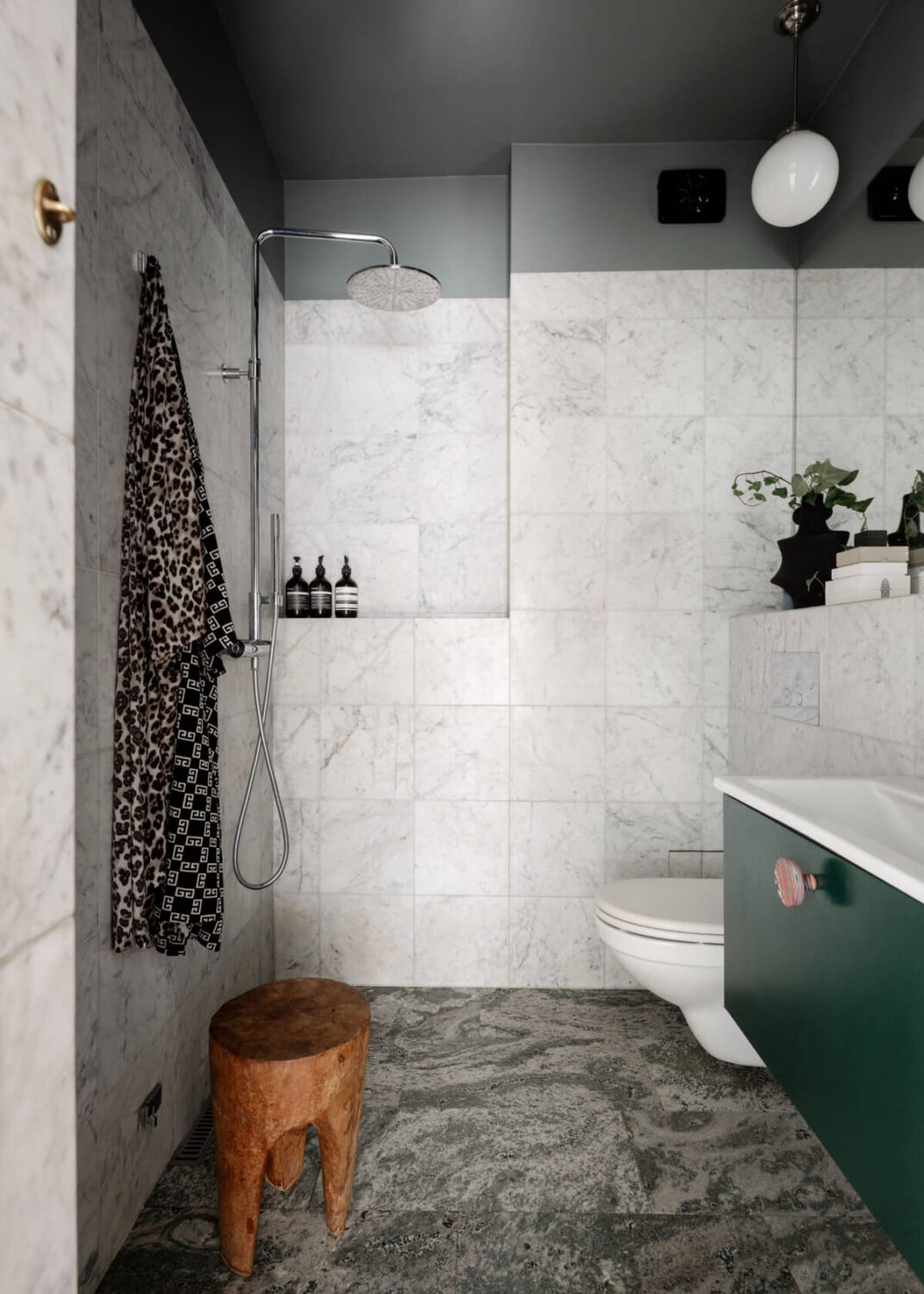 An Amazing Swedish House with Pink and Gray Rooms 28 bathroom marble tiles green bathroom vanity