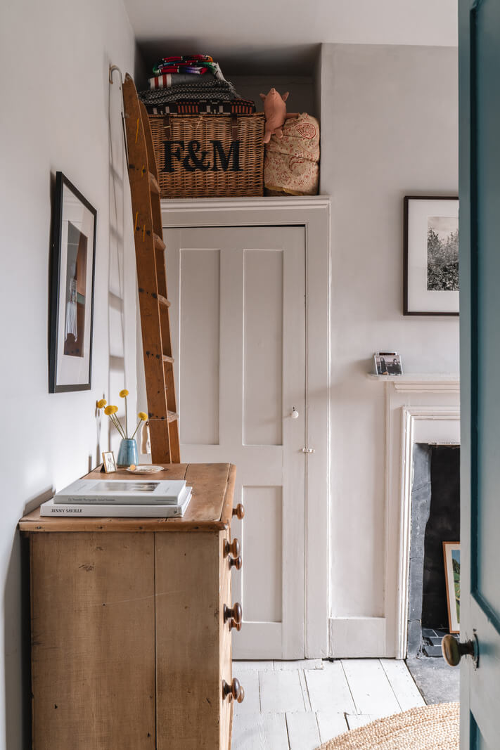 A Cozy Victorian Home Painted in Moody Blue and Gray Tones 21 bedroom white floorboards