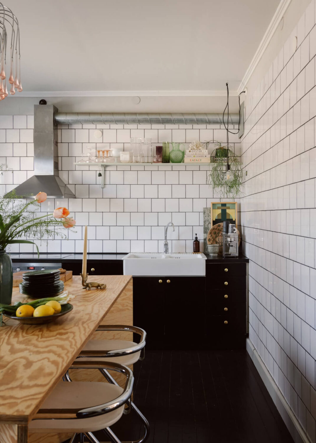 An Amazing Swedish House with Pink and Gray Rooms 10 black and white kitchen