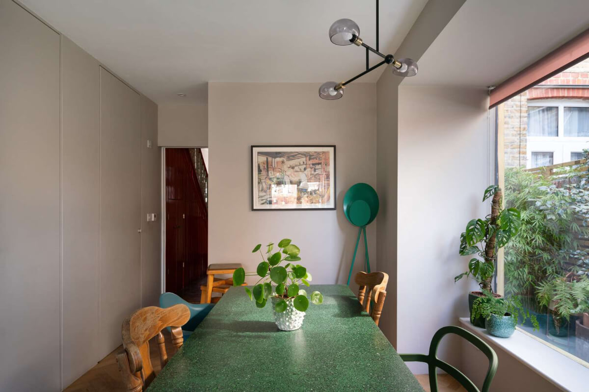 A Colorful Home with a Gold Extension in North London 9 dining room
