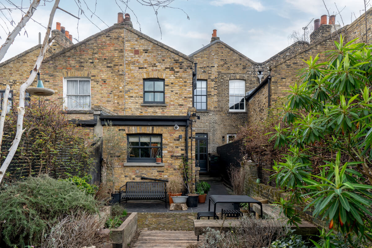 A Cozy Victorian Home Painted in Moody Blue and Gray Tones 34 garden london home