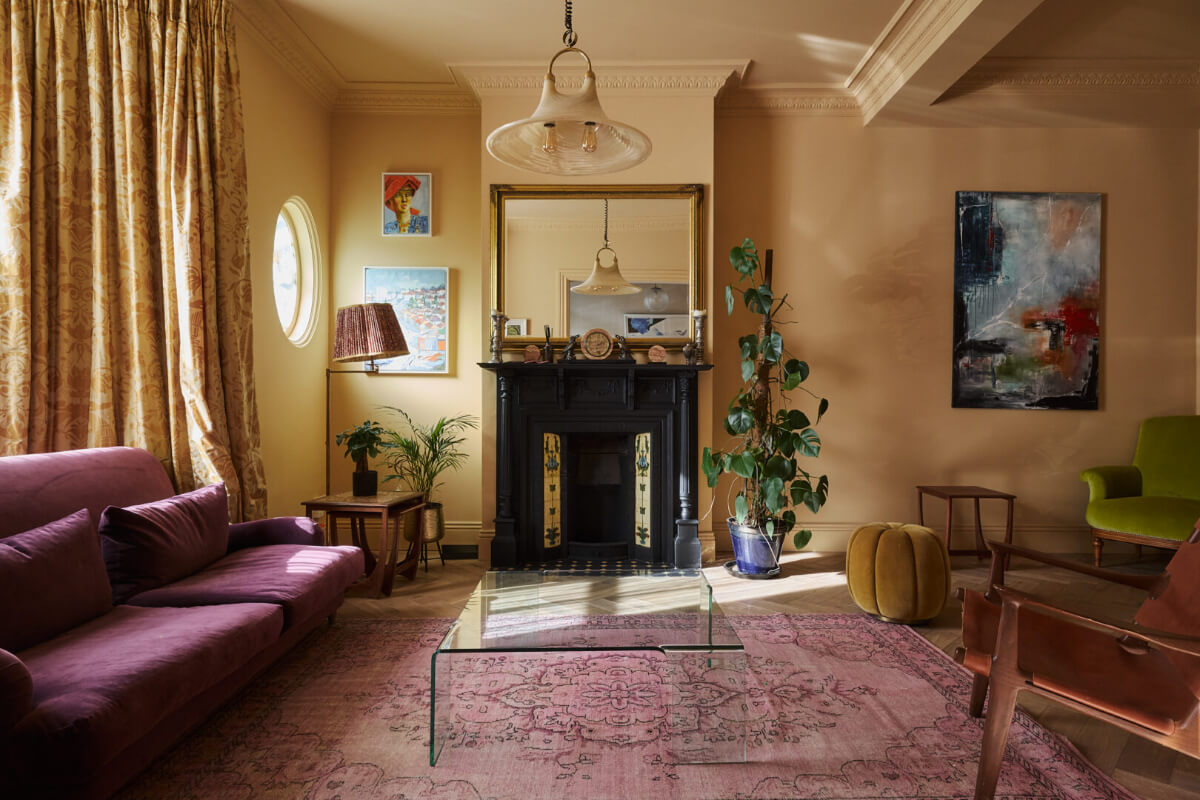 A Beautiful Extended Edwardian House Blends Period Features with Modern Design 1 golden yellow living room fireplace period details
