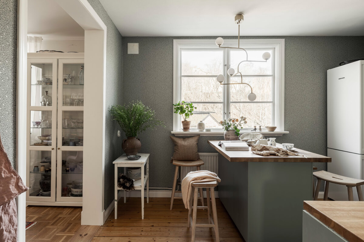 A Swedish Duplex Apartment Inspired by A Danish Summer House 23 green wallpaper kitchen