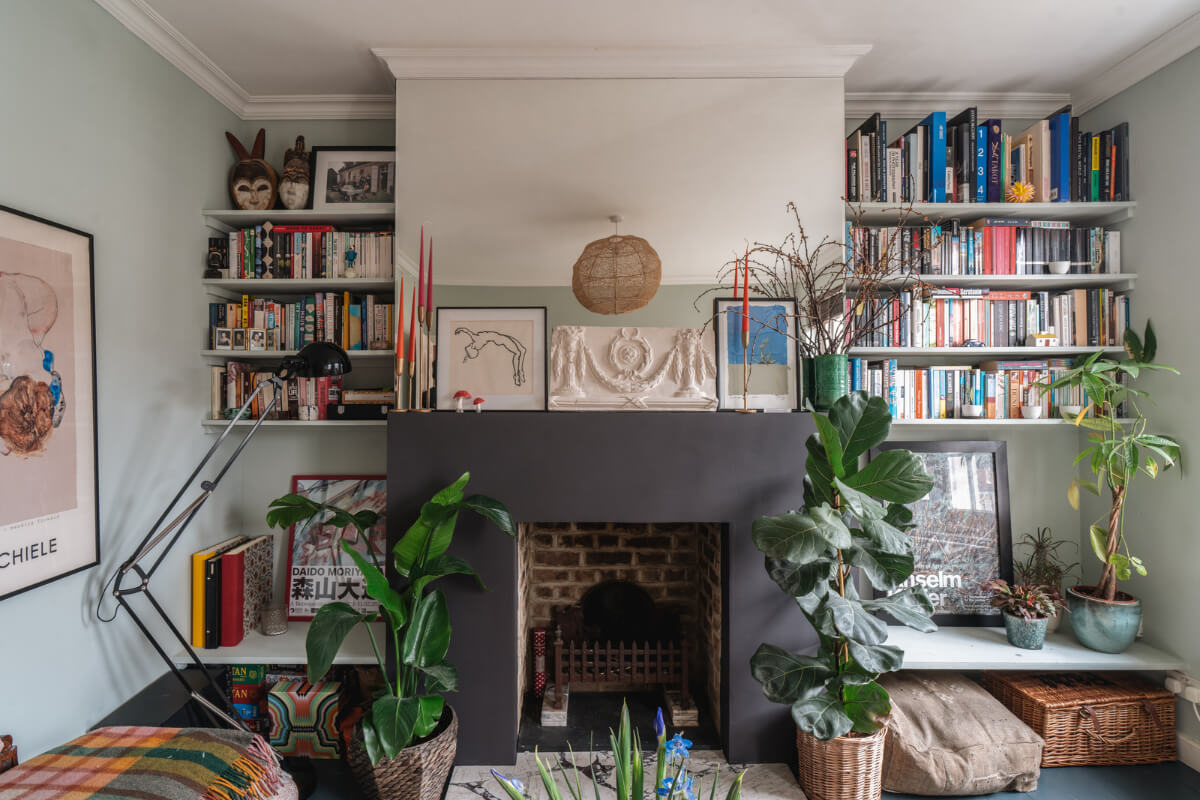 A Cozy Two-Bedroom Attic Apartment in a Victorian Townhouse 1 living room bookshelves