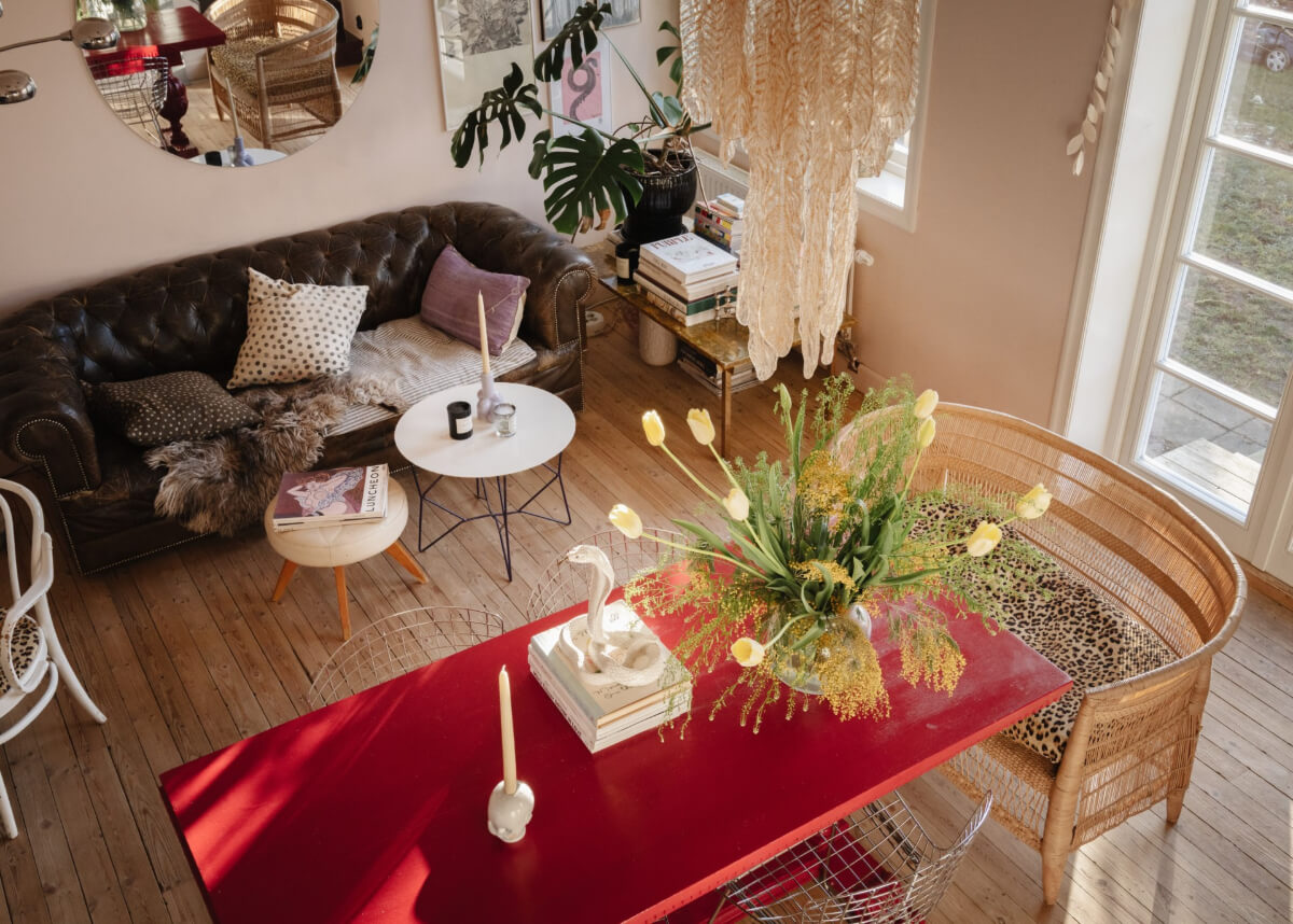 An Amazing Swedish House with Pink and Gray Rooms 2 living room from above red table chesterfield sofa round mirror