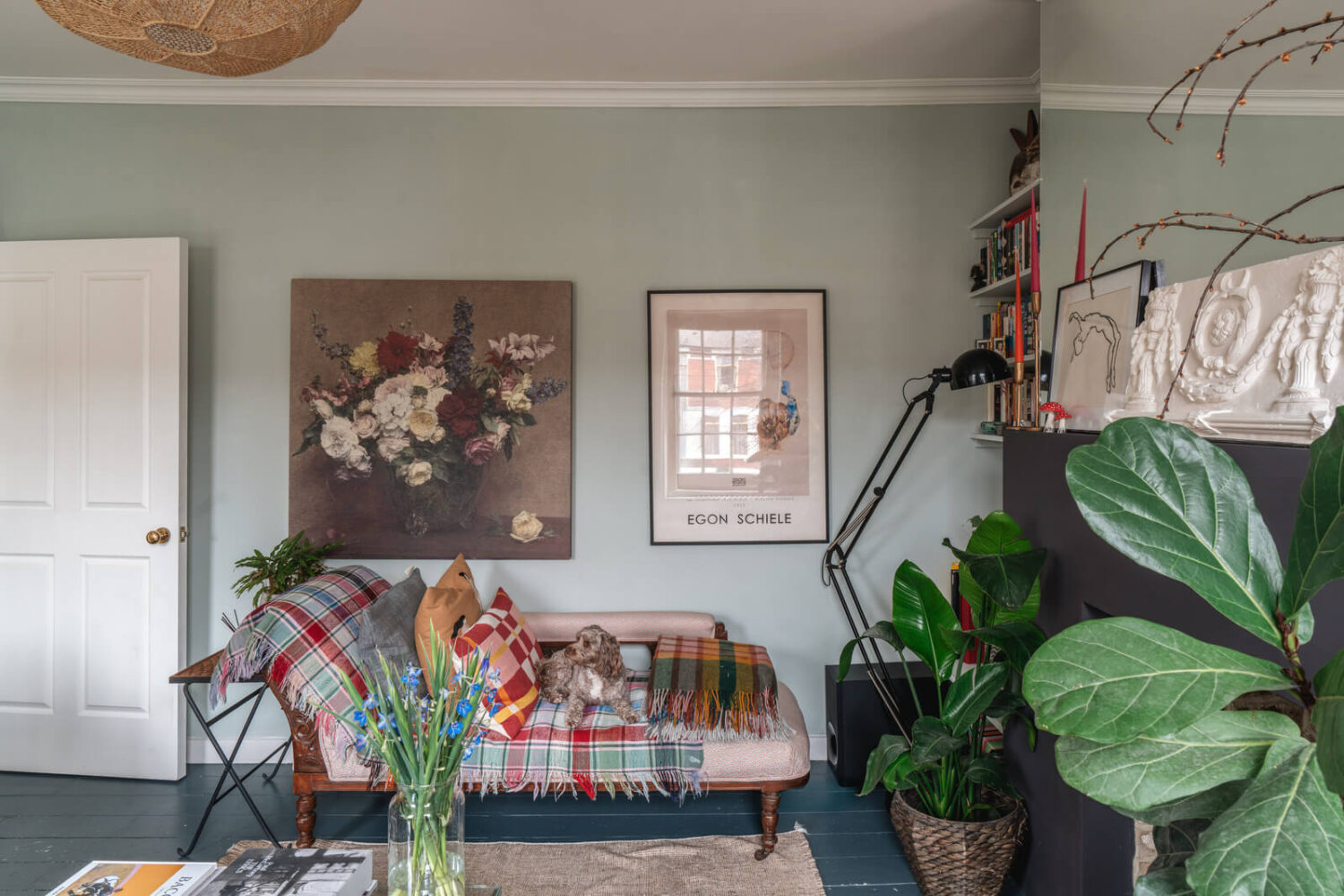 A Cozy Two-Bedroom Attic Apartment in a Victorian Townhouse 2 living room plants antique sofa
