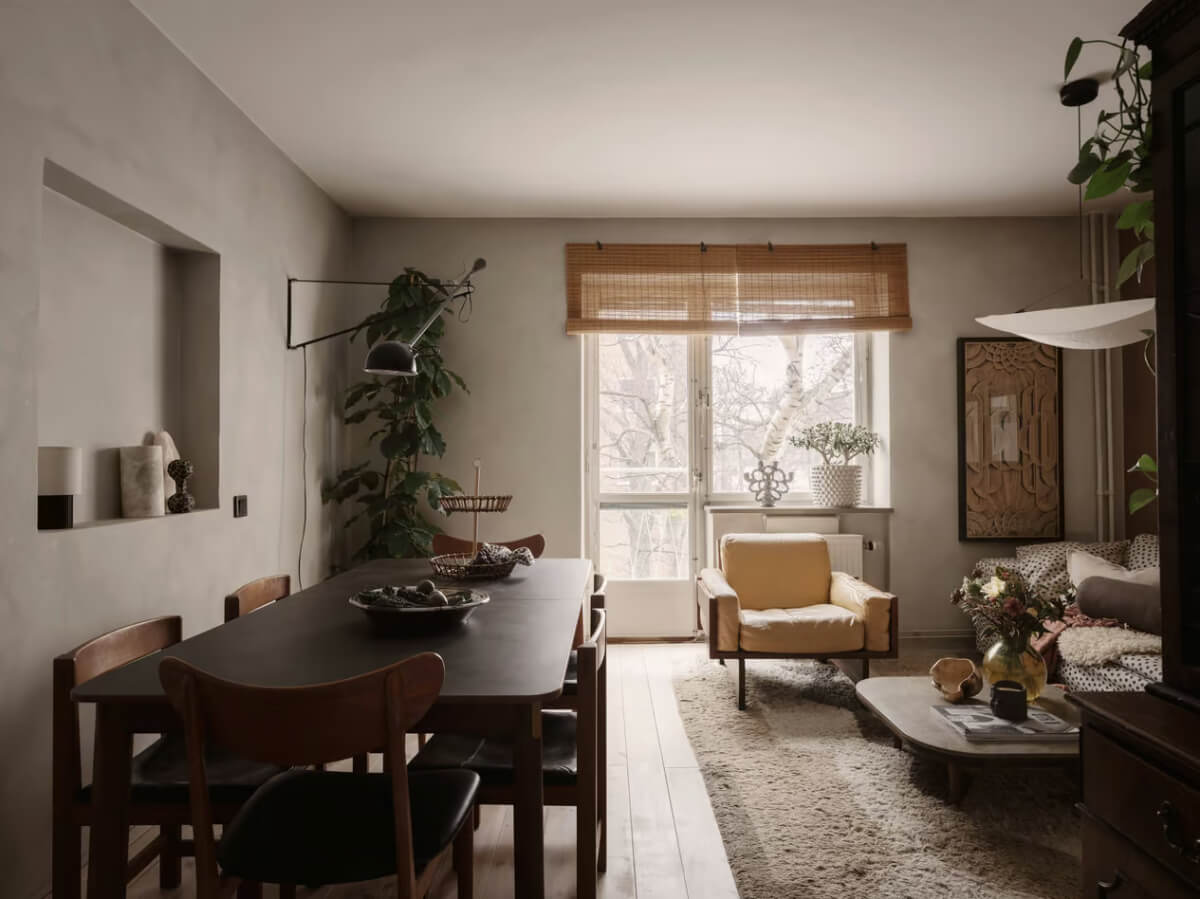 Limewash Walls in Muted Tones in a Swedish Apartment 1 modern living room plaster gray walls