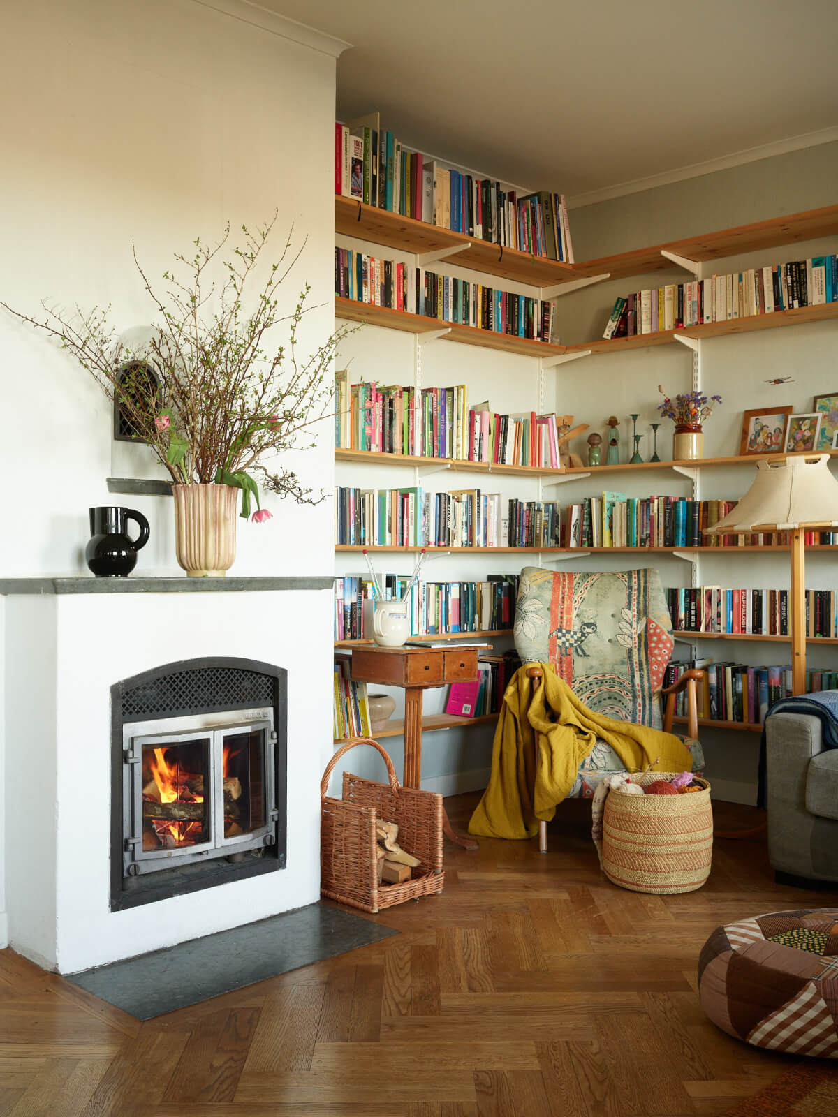 reading nook with shelves and fireplace