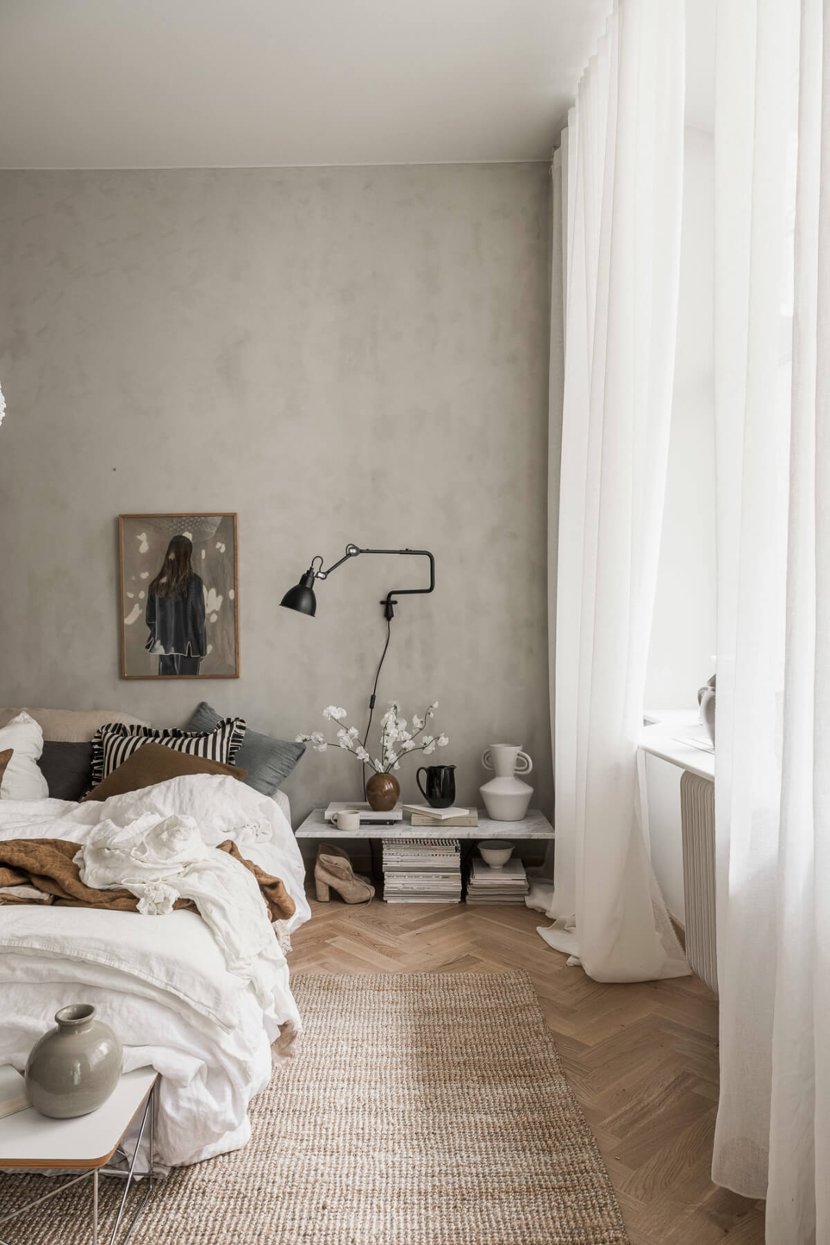 scandi bedroom gray plaster walls marble shelf as nightstand