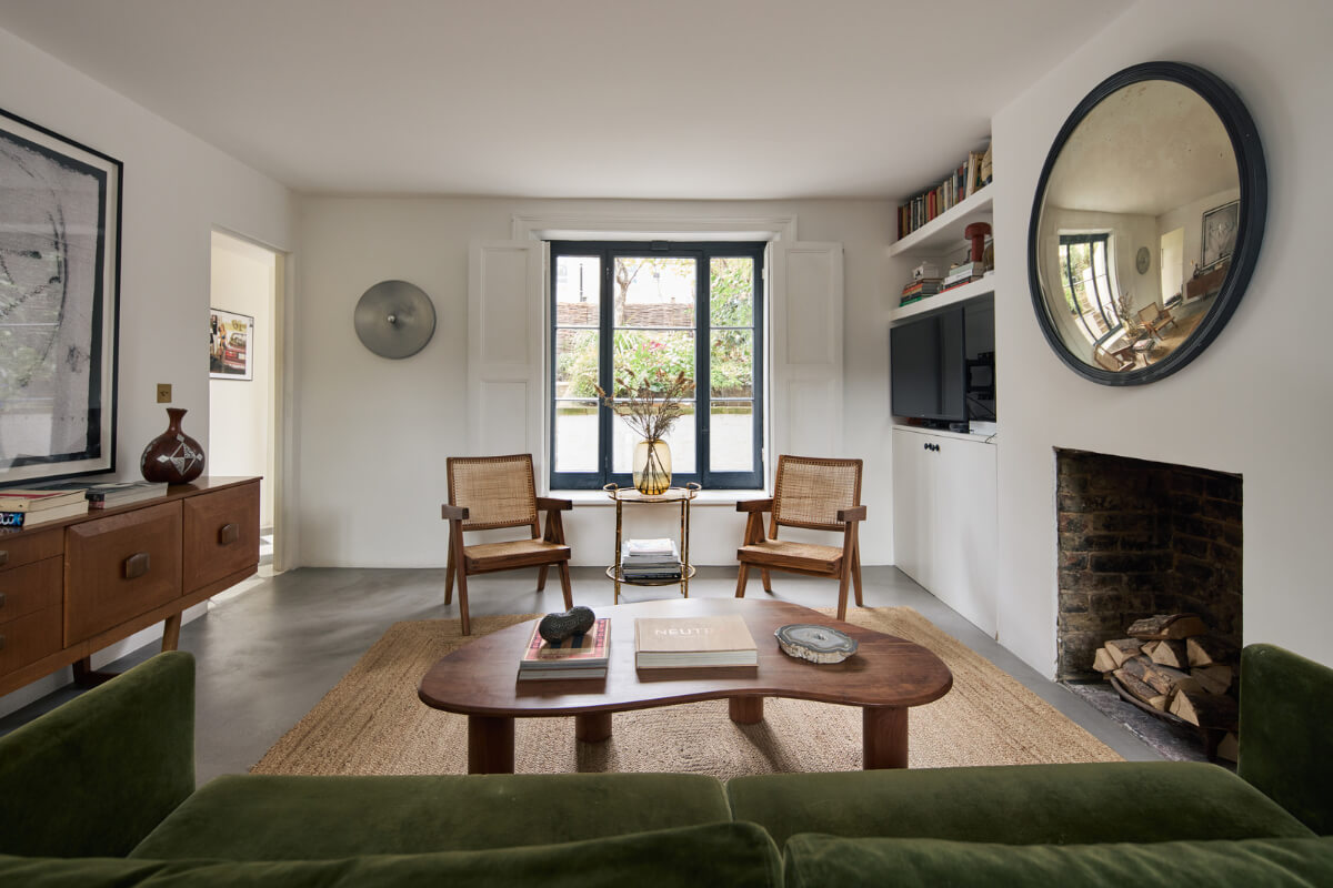 An Early Victorian House with a Unique Barrel-Vaulted Artist's Studio 7 sitting room fireplace green velvet sofa