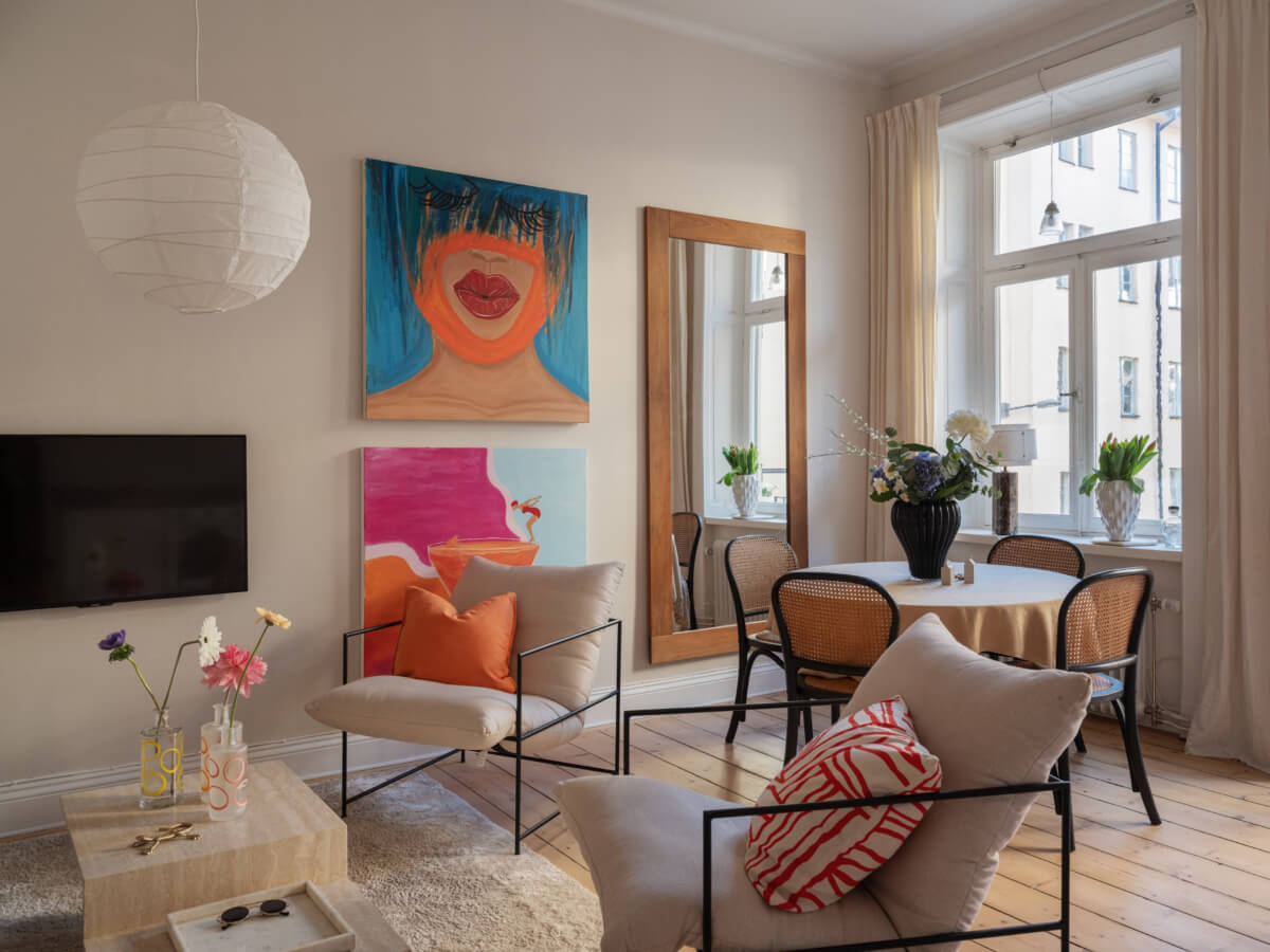 A Small Apartment with Contemporary Furniture in a 19th-Century Building 1 small living room wooden floor colorful art