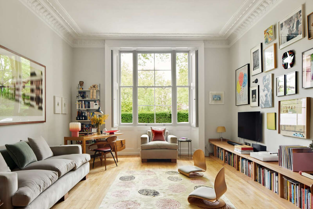 A Contemporary Architect-Designed Duplex Within a Grand Victorian Terrace 1 spacious living room large window gallery wall