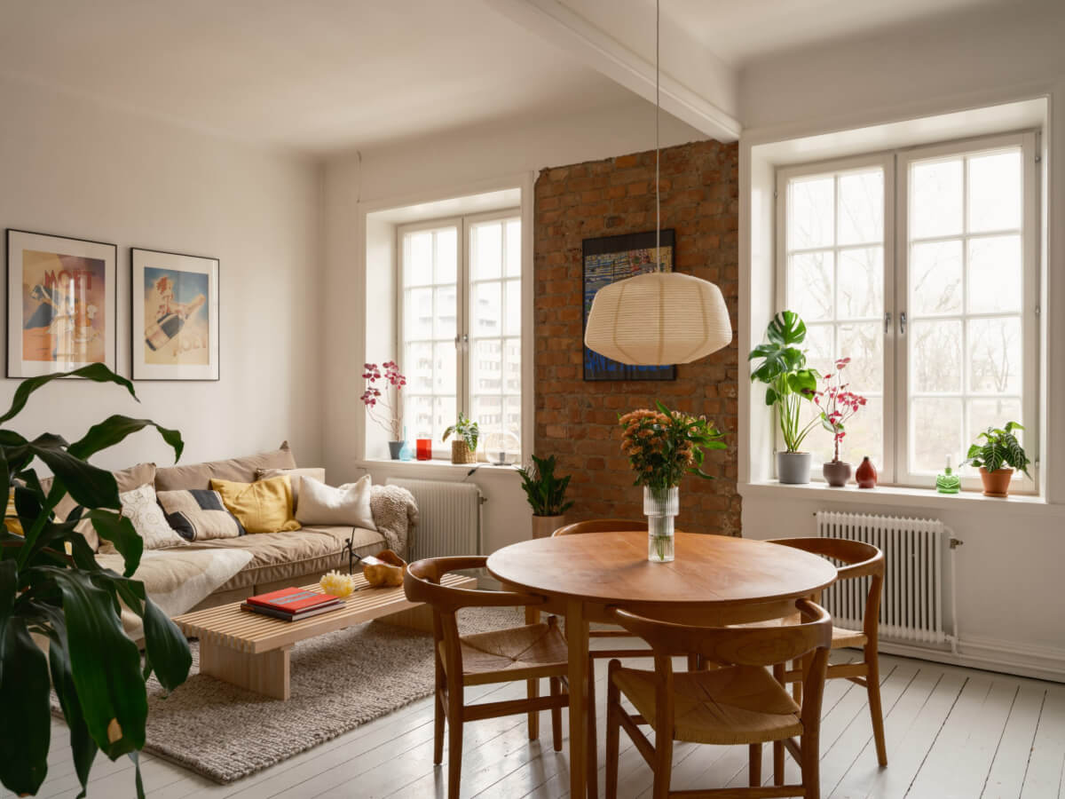 A Studio Apartment with an Exposed Brick Wall 1 studio apartment exposed brick wal