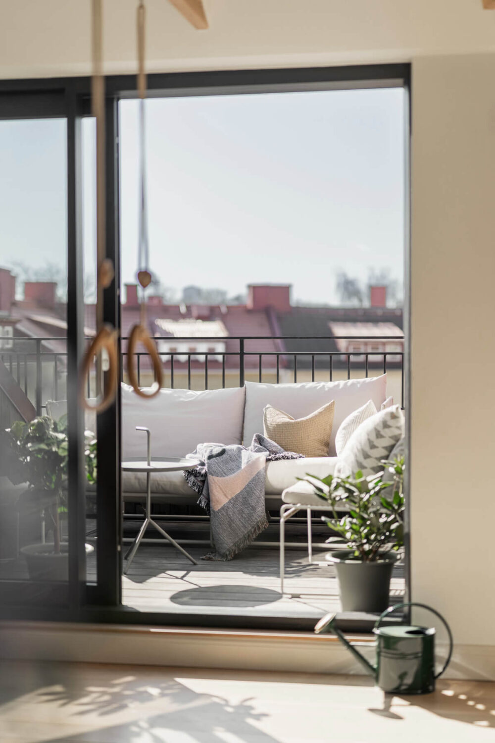 A Swedish Duplex Apartment Inspired by A Danish Summer House 5 sunny balcony living room