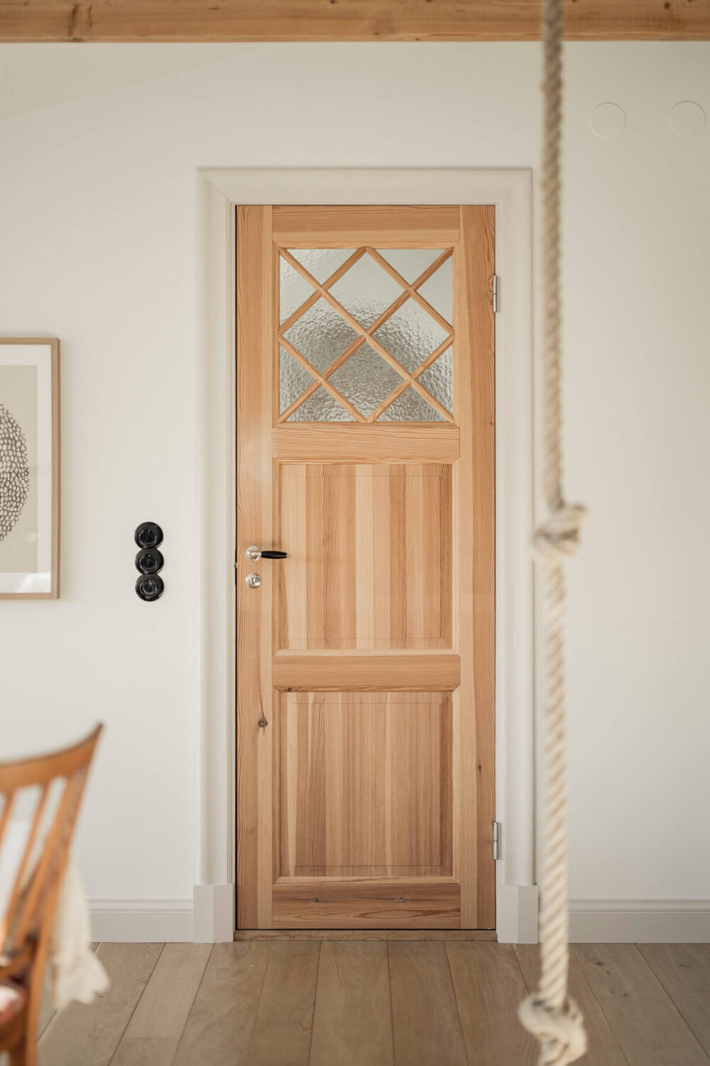 A Swedish Duplex Apartment Inspired by A Danish Summer House 13 wooden door
