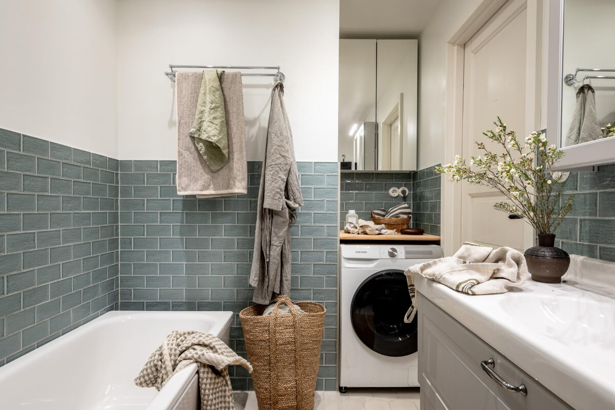 A Natural Color Palette, Period Features, & Grand Rooms in a Swedish Home 43 bathroom blue-green tiles