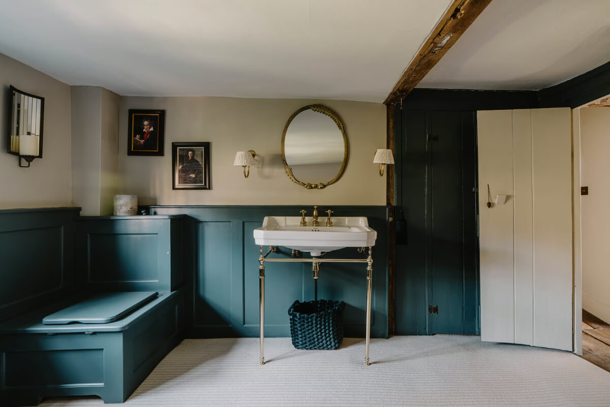 Serene Colors and Historic Elements in an Elizabethan Home in Wiltshire 15 bathroom blue wood paneling