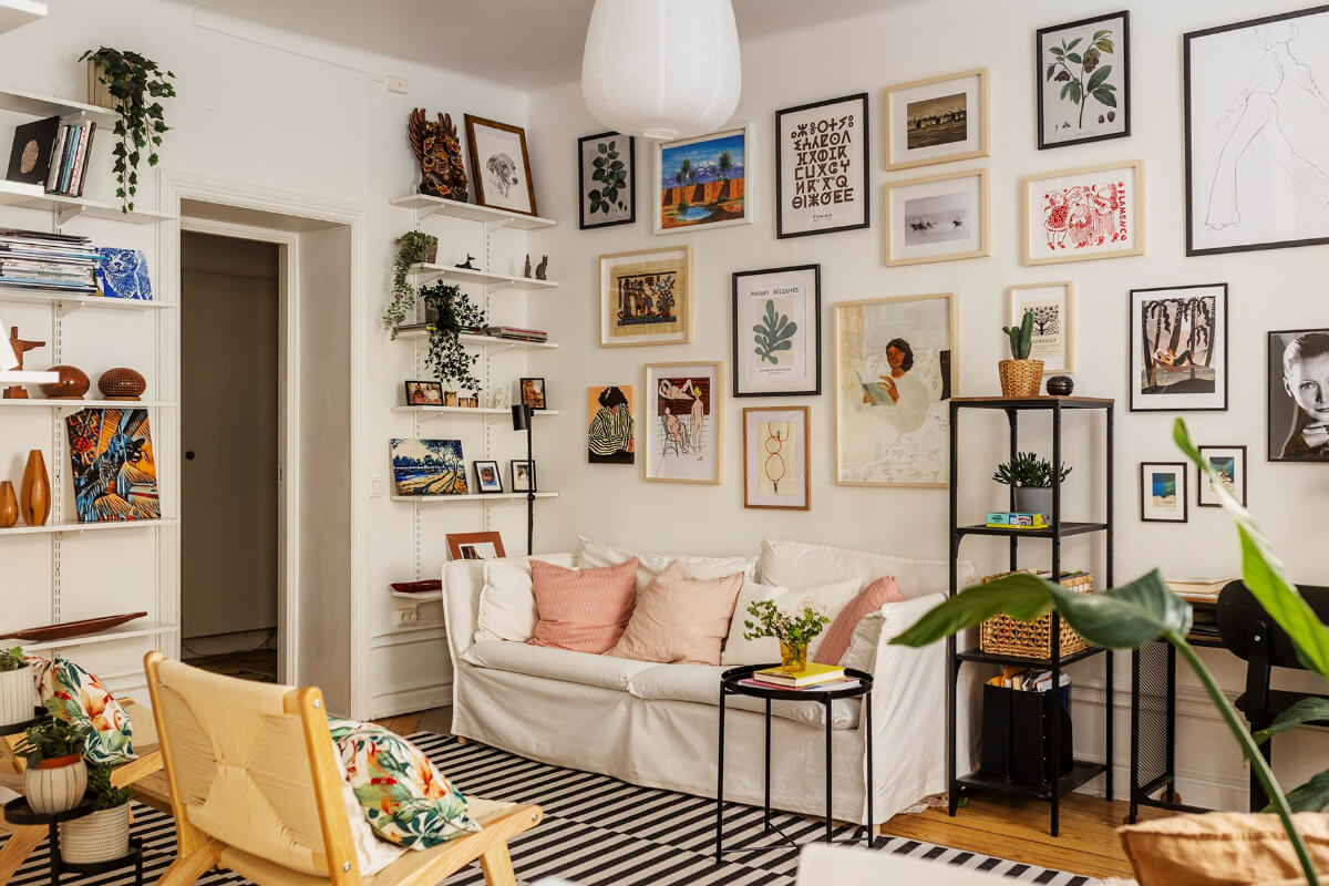 A Bright Family Apartment in Södermalm 1 bright white living room art on walls