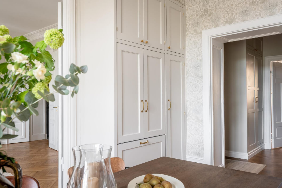 A Stunning Kitchen in a Classic Renovated Turn-of-the-Century Apartment 8 classic kitchen cabinets brass handles