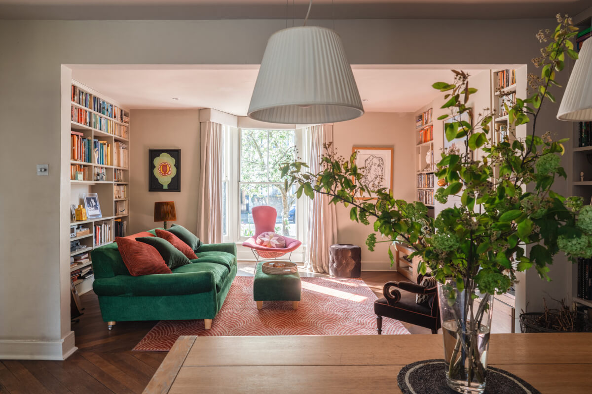 An Edwardian House with Muted Tones, Natural Materials, and a Landscaped Garden 5 double living room bookshelves bay window