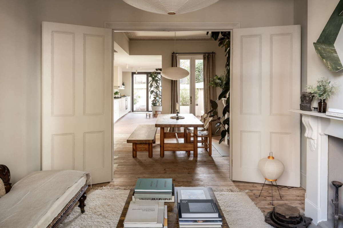 Natural Materials and Period Features in a Restored Victorian House 1 double wooden doors open-plan living area