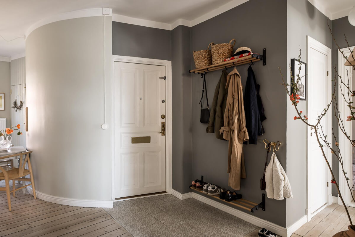 Gray Tones and a Classic Kitchen in a Swedish Apartment 29 entry hall rounded wall Gray Tones and a Classic Kitchen in a Swedish Apartment