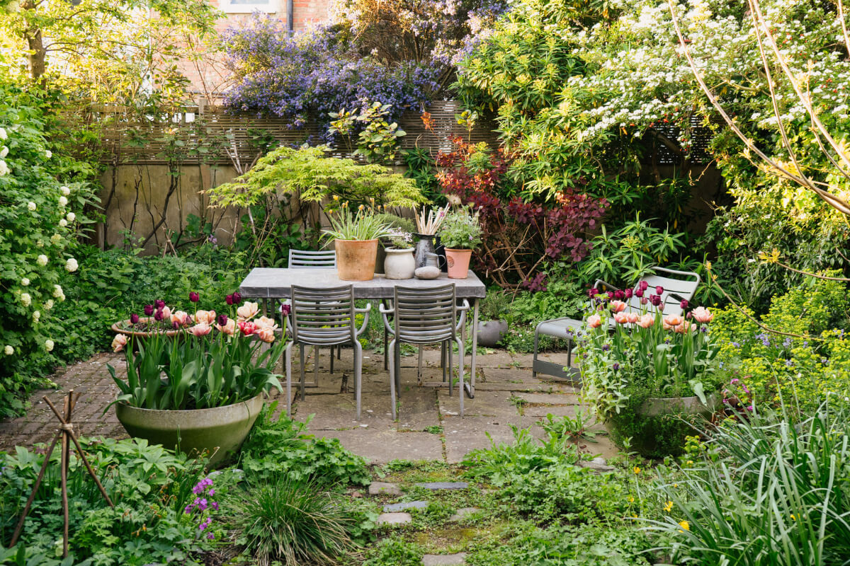 An Edwardian House with Muted Tones, Natural Materials, and a Landscaped Garden 15 garden-table