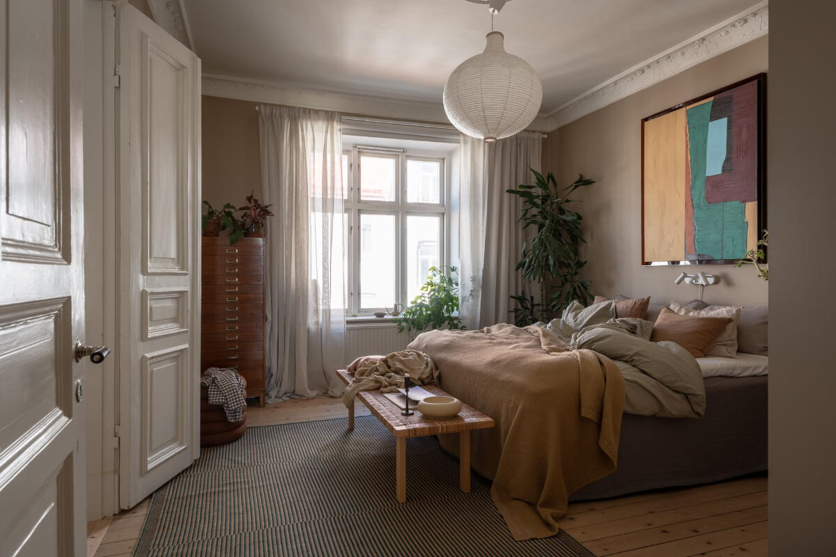A Natural Color Palette, Period Features, & Grand Rooms in a Swedish Home 13 gray bedroom white stucco