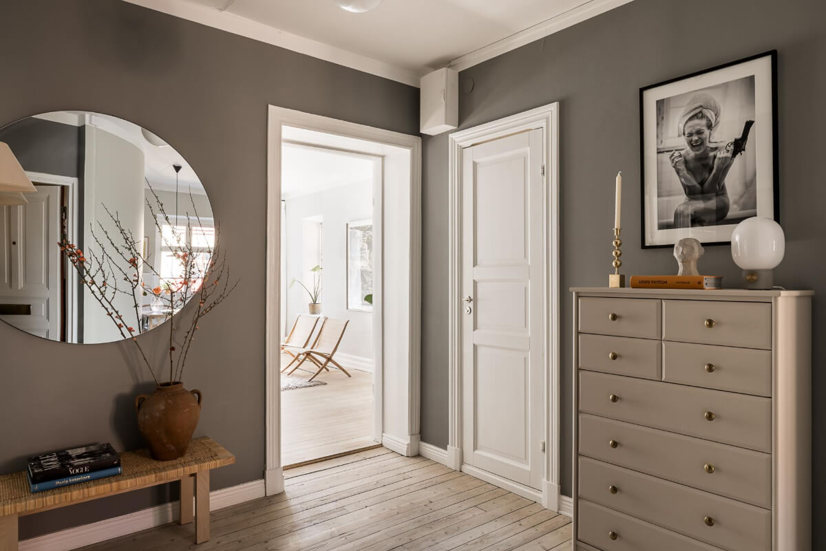 Gray Tones and a Classic Kitchen in a Swedish Apartment 27 gray hall large round mirror