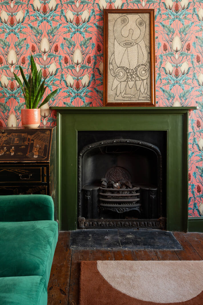 Colorful Design and Historic Features in a Charming English Home 9 green fireplace detail nordroom