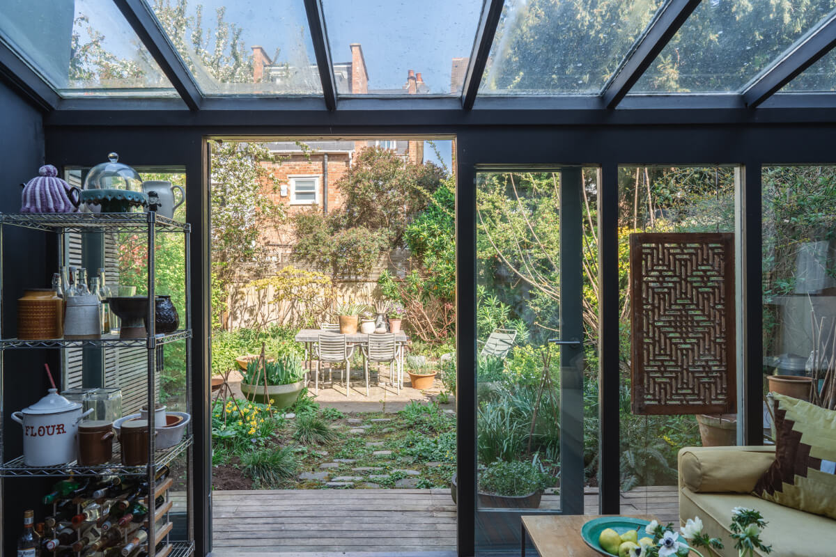 An Edwardian House with Muted Tones, Natural Materials, and a Landscaped Garden 12 kitchen extension garden