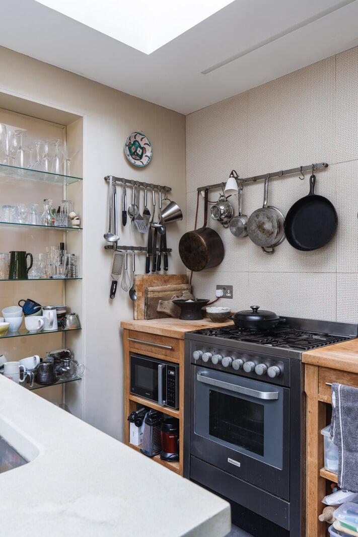 An Edwardian House with Muted Tones, Natural Materials, and a Landscaped Garden 11 kitchen glass shelves