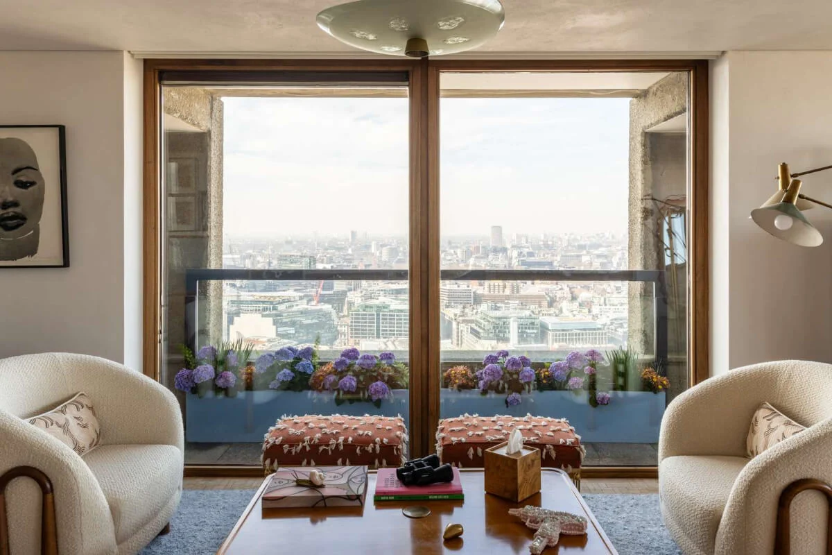 Oak and Marble in a Spectacular Brutalist Apartment in London 4 large windows london view
