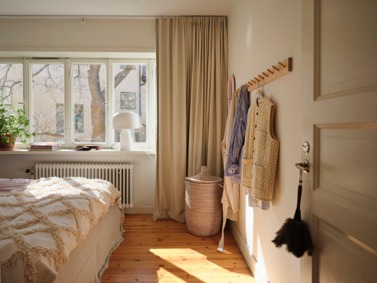 A Light-Filled Functionalist Apartment in Stockholm 12 light filled bedroom wooden floor