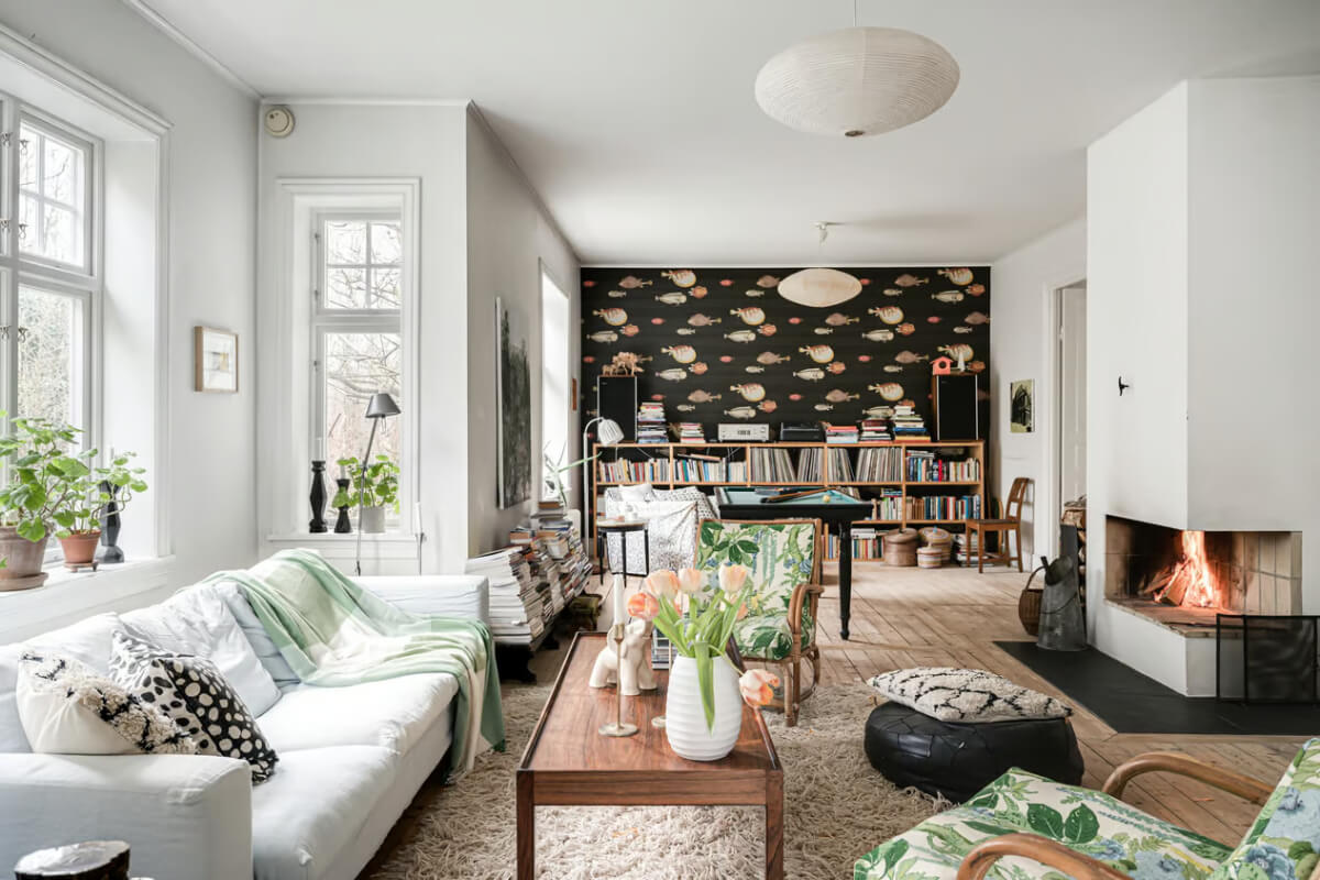 A Beautiful Former Summer House in Southern Sweden 2 light open plan living space summerhouse fish wallpaper