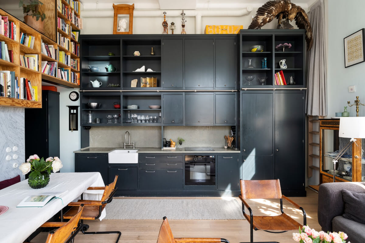 Pale Blue Walls and Huge Windows in a Swedish Loft Apartment 6 loft kitchen double upper cabinets