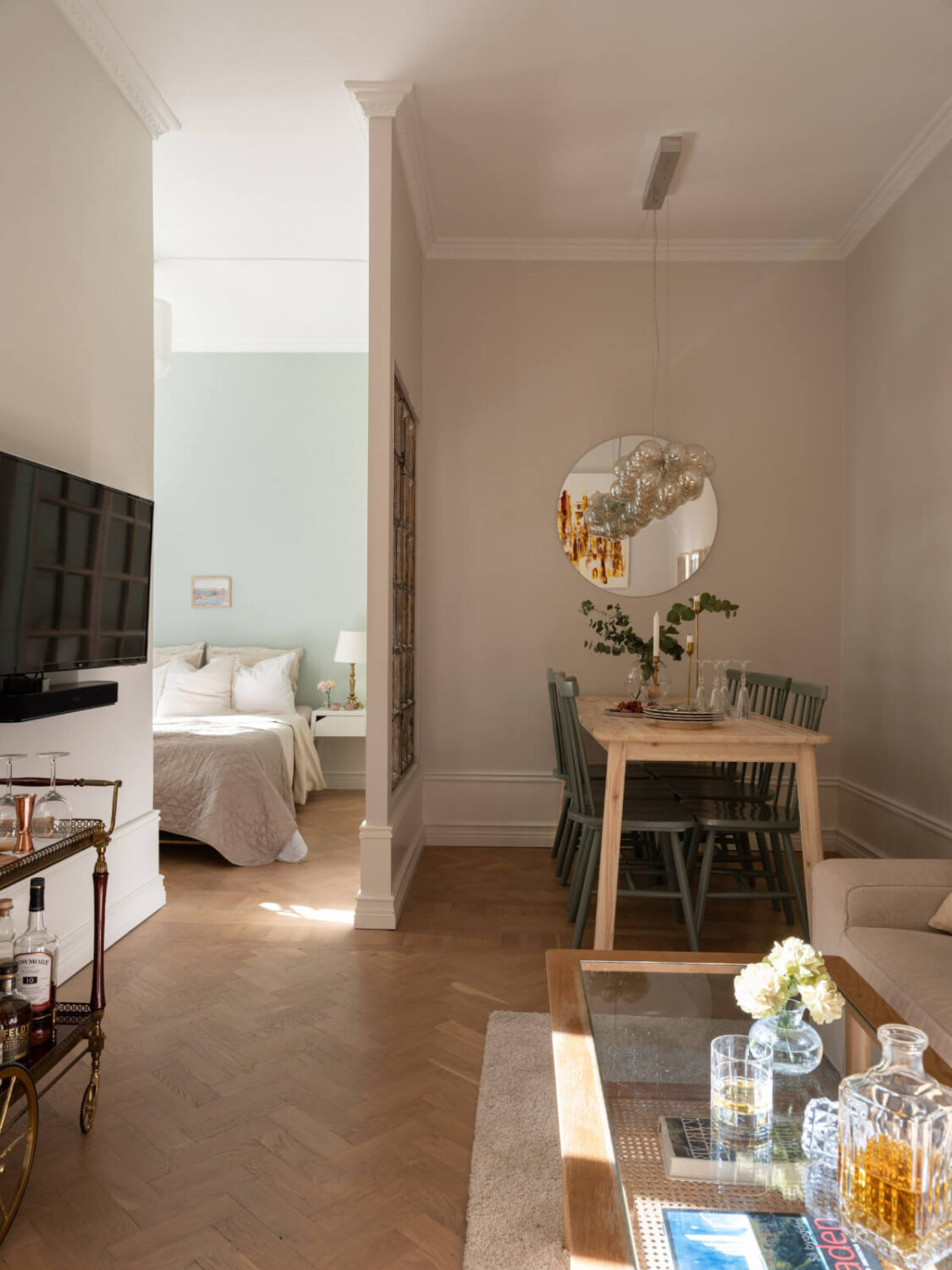 A Small Apartment with Green Color Accents and a Cozy Patio Terrace 11 open-plan layout swedish apartment