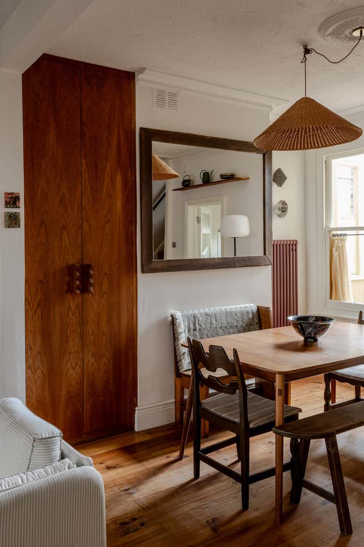 Reclaimed Materials and Custom Storage in a Serene London Home 9 open plan living space built-in storage