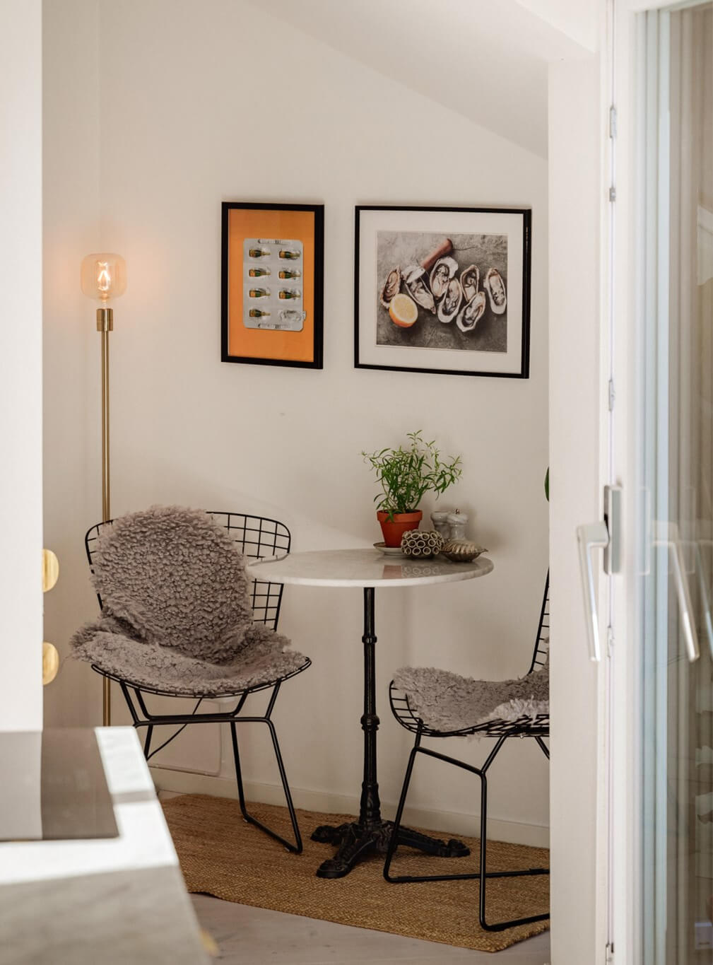 A Bright Attic Apartment with Exposed Beams and a Roof Terrace 20 small round table